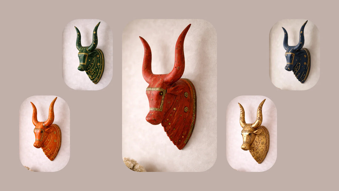 A collection of handcrafted wooden Nandi heads with distressed finish, displayed as wall décor or spiritual accent pieces