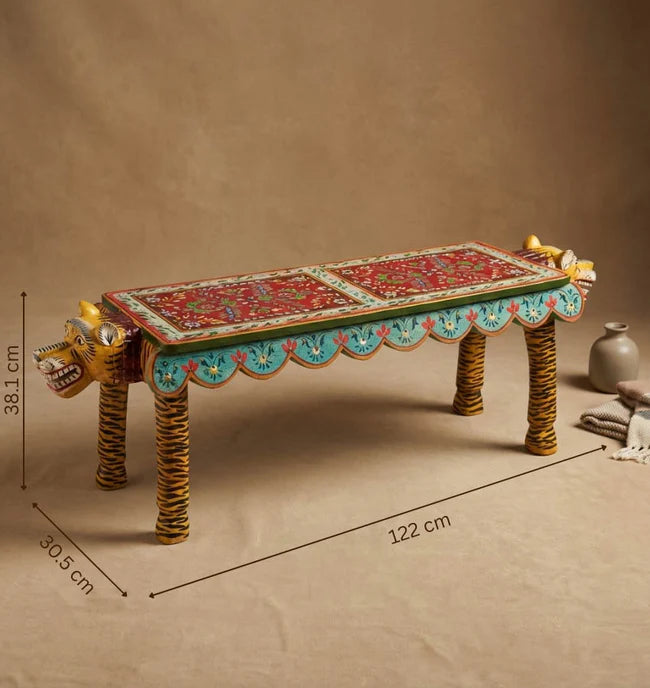 Decorative table with intricate designs on a brown background