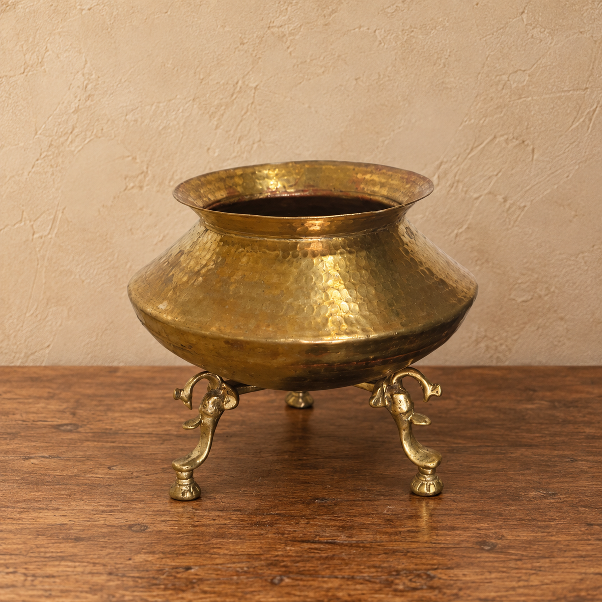 Brass planter with peacock legs for traditional home decor