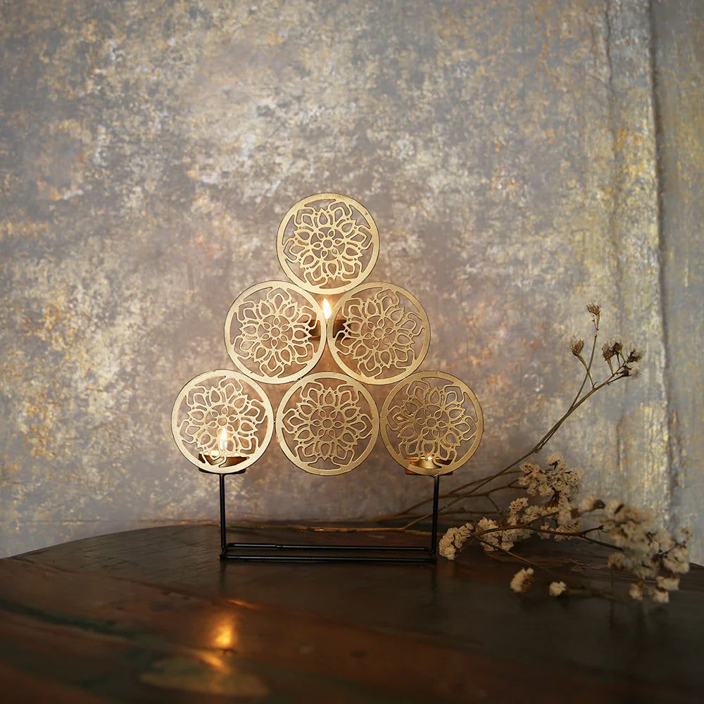 Decorative candle holder with floral patterns 